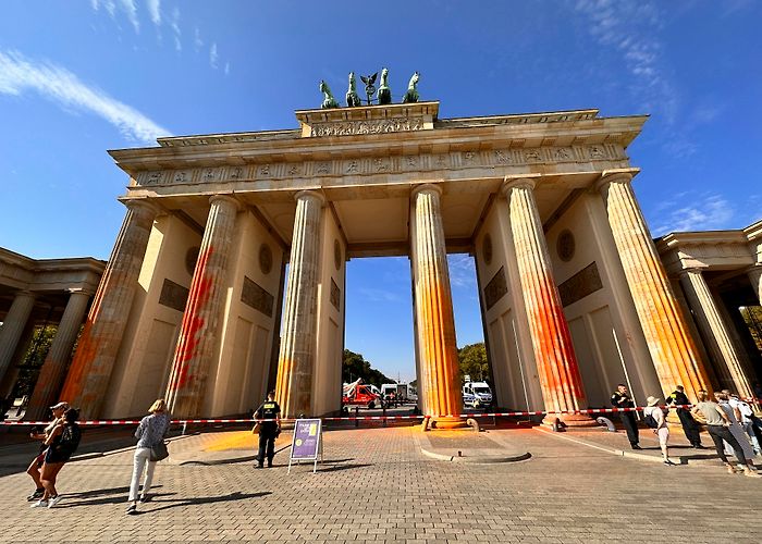 Brandenburg Gate Climate activists spray Berlin's Brandenburg Gate with orange ... photo