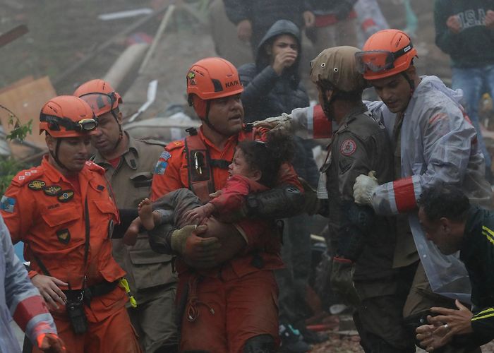 Imigrants House Heavy rains kill at least 7 in Rio de Janeiro state, 4-year-old ... photo