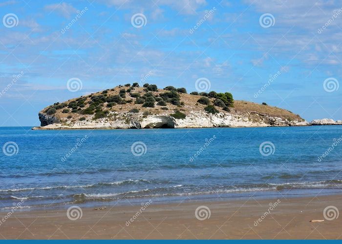 Portonuovo beach Vieste - Isolotto Di Portonuovo Dalla Spiaggia Stock Image - Image ... photo