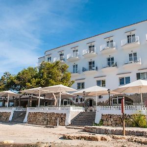 Готель Hostal Xuroy Cala Alcaufar Exterior photo