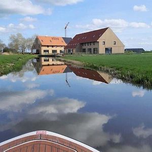 Nice Frisian Family Villa On The Water Leons Exterior photo