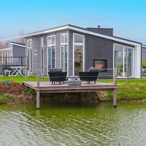 Modern Chalet On The Water At A Holiday Park Вемельдінге Exterior photo